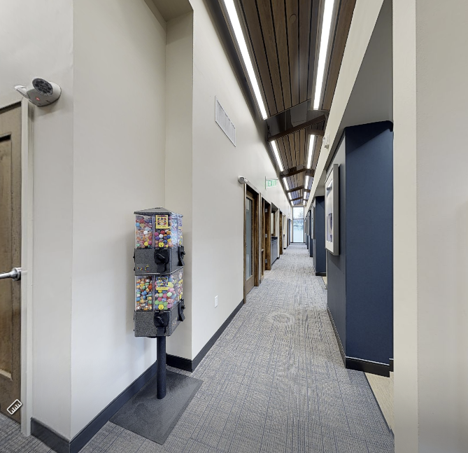 Vaulted ceilings give the hallway an open feel.  Toy machine for the kids is a hit!